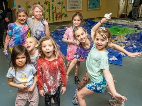 a group of children in a pool