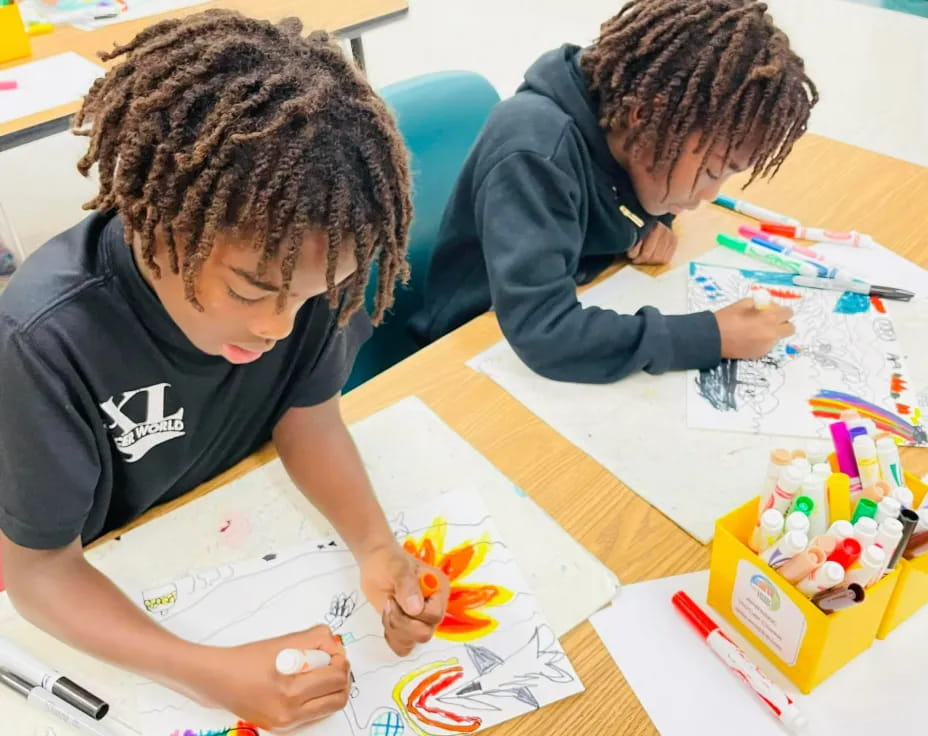 a couple of boys painting