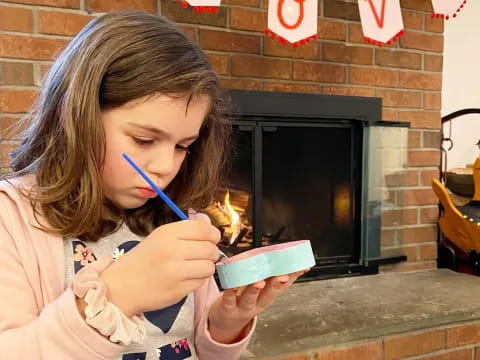 a young girl eating ice cream