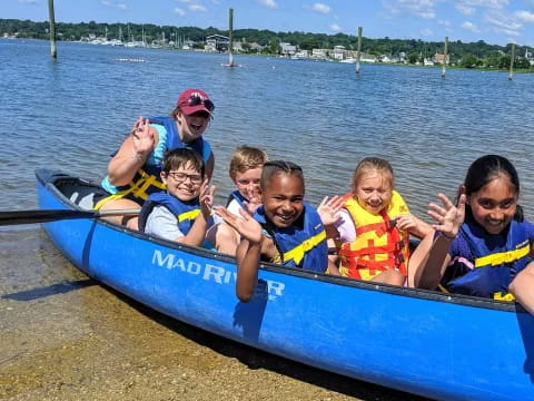 a group of people in a raft