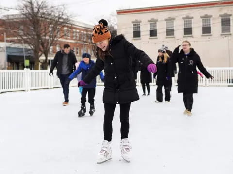 a group of people ice skating