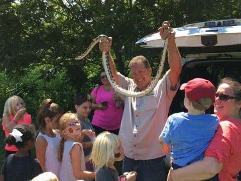 a person holding a baby