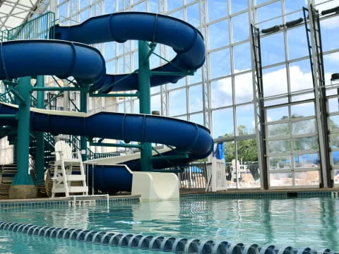 a water slide in a pool