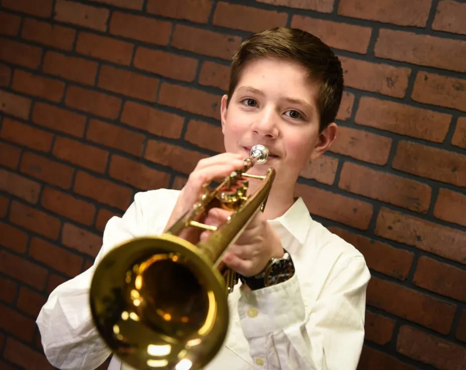 a person playing a trumpet