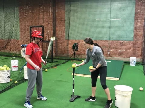 a couple of people playing golf