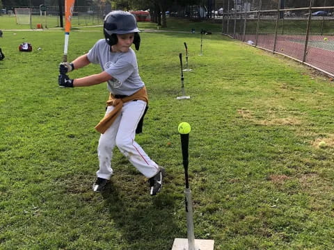a kid playing baseball