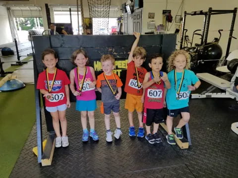 a group of children posing for a photo