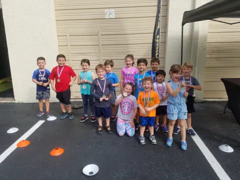 a group of kids posing for a photo