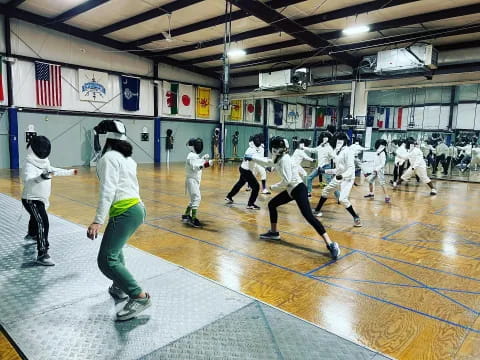 a group of people in a gym