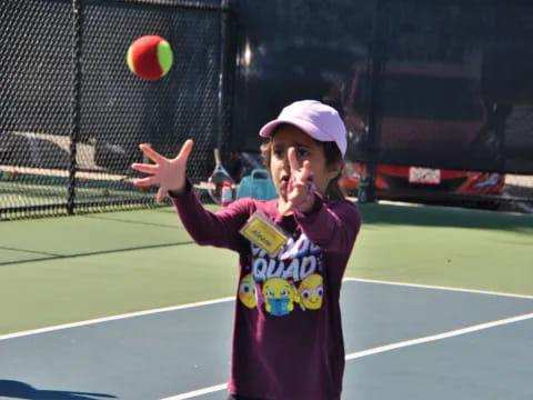 a girl playing tennis