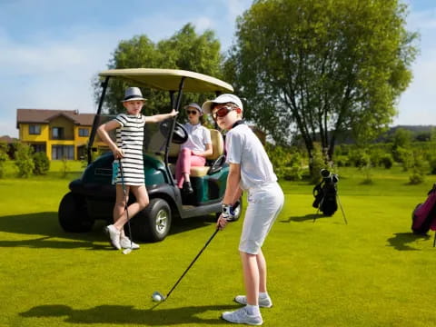 a man and a woman playing golf