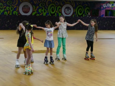 a group of girls on an ice rink