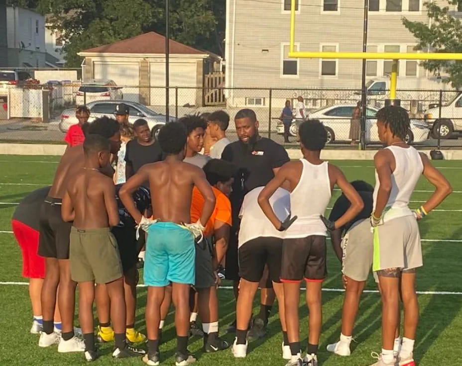 a group of people in shorts