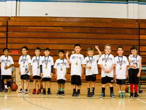 a group of kids in white shirts
