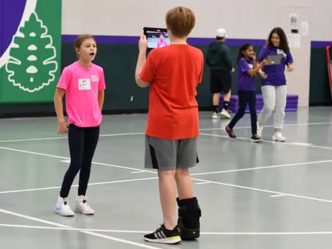 a group of people in a gym