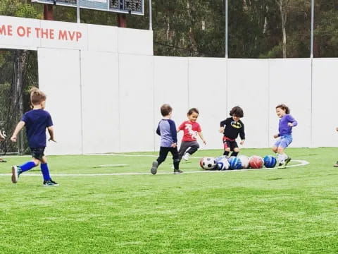 kids playing football on a field