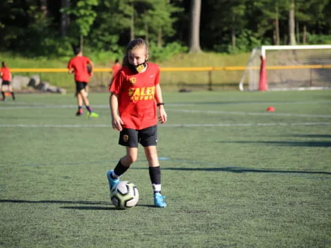 a girl playing football