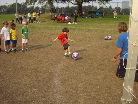 kids playing with football ball