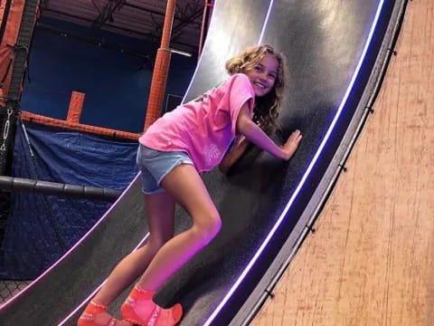 a woman on a trampoline