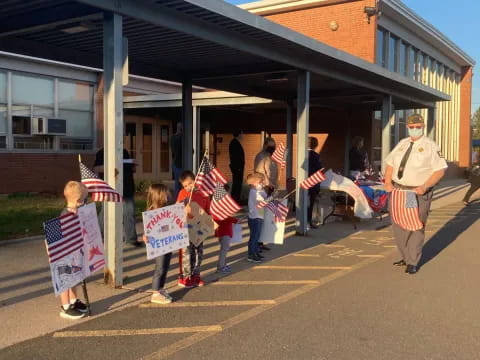 a group of people holding signs