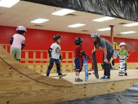 a group of kids with skateboards