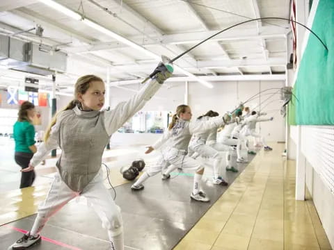 a group of people in a gym