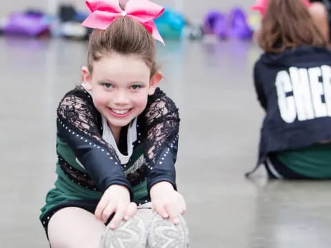 a child sitting on the ground