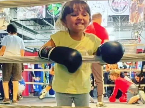 a young boy in a gym