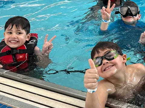 a group of people in a pool