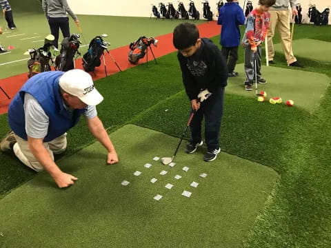 a group of people playing golf