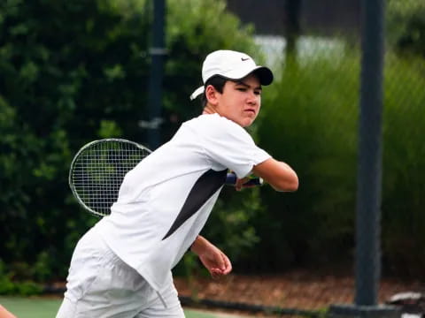 a man playing tennis