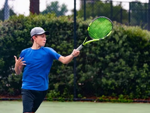 a man playing tennis