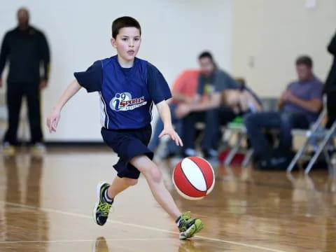 a boy playing basketball