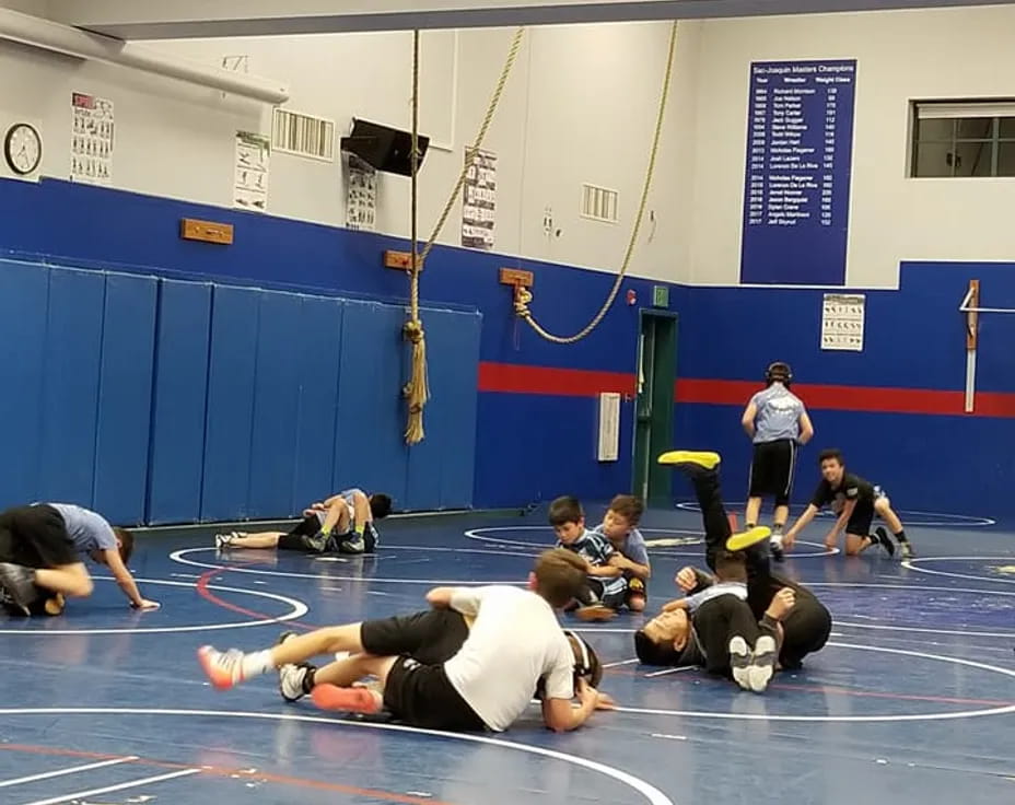 a group of people in a gym