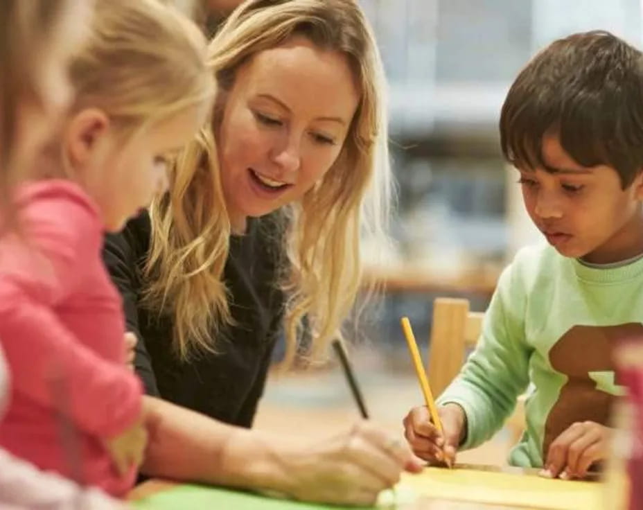 a woman and a couple of children