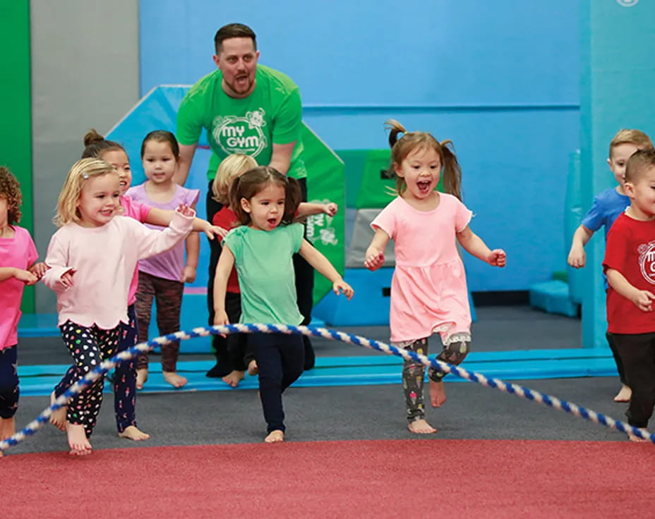 a group of children dancing