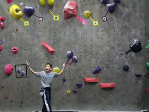 a boy playing in the sand