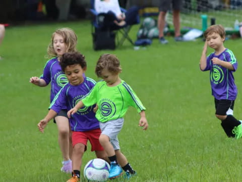 kids playing football on a field