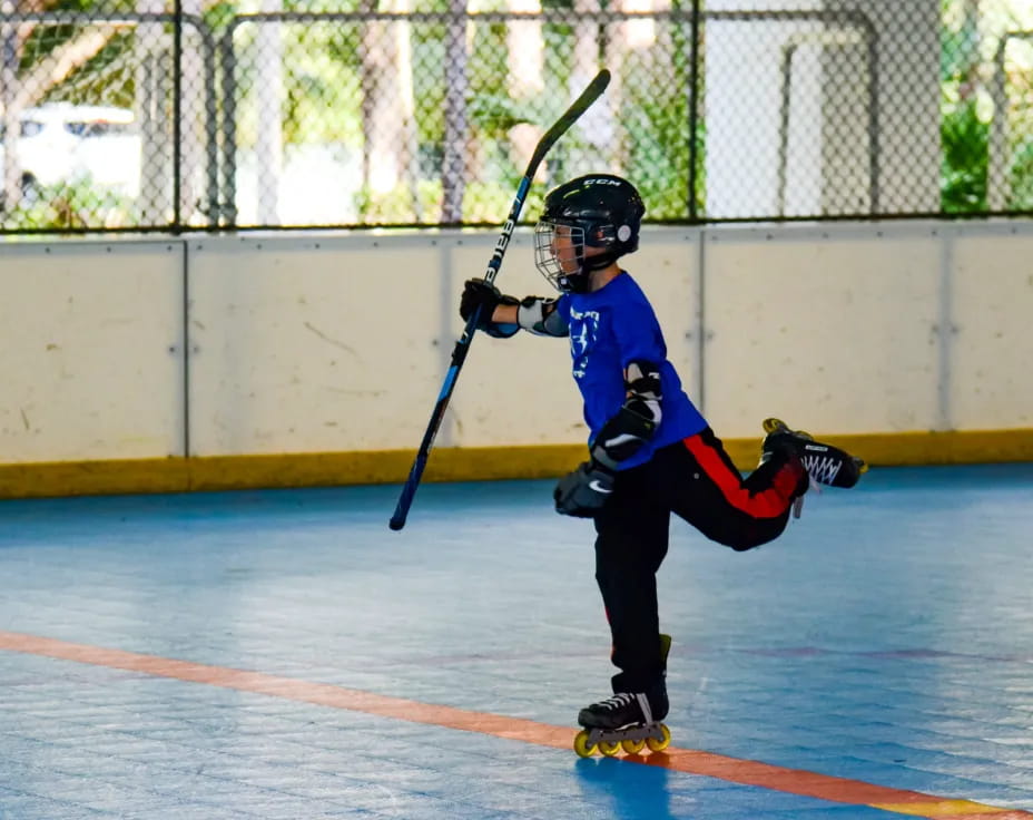 a young boy playing baseball