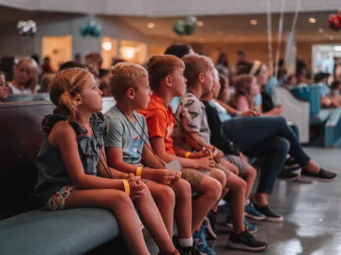 a group of people sitting on a couch