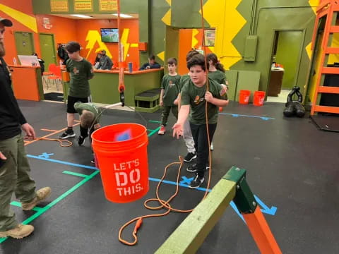 a group of people in a gym