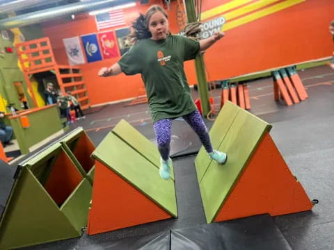a person jumping on a trampoline