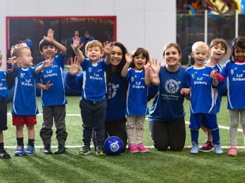 a group of kids posing for a picture