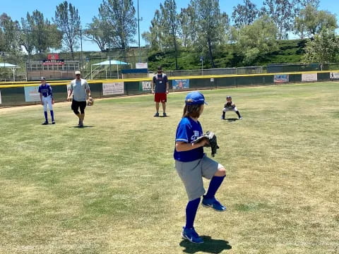 a girl playing baseball