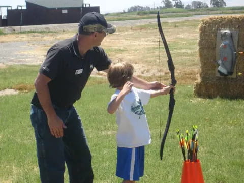 a person and a boy fishing