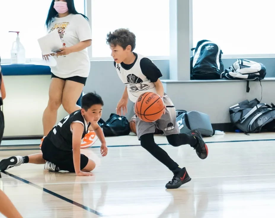 a boy playing basketball