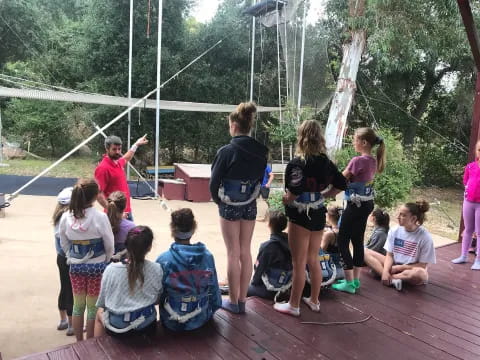 a group of people on a deck