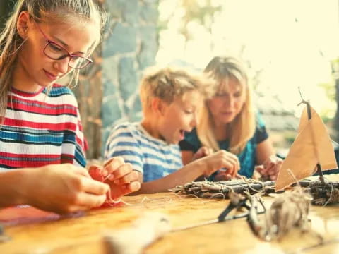 a group of children playing with sand