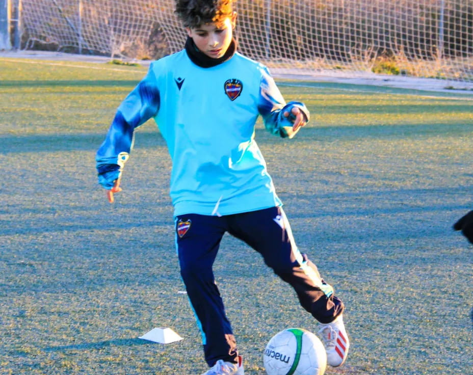 a girl playing football