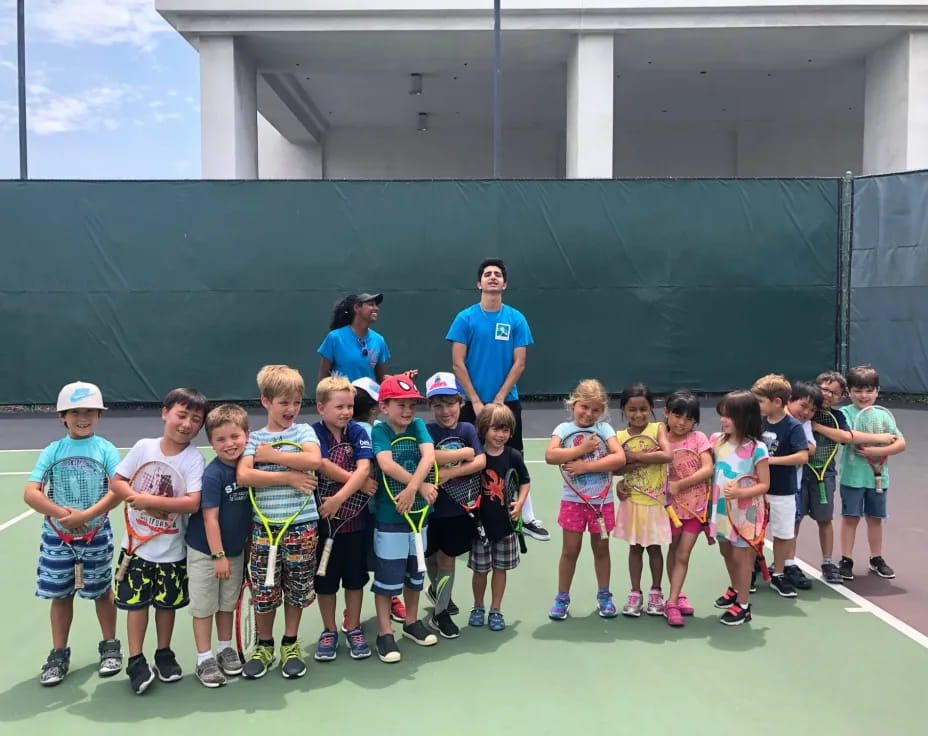 a group of kids posing for a photo